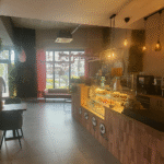 20250922_1106_Yazısız Kafe Görünümü_remix_01k5ran13henp8pr72paz1kp2w